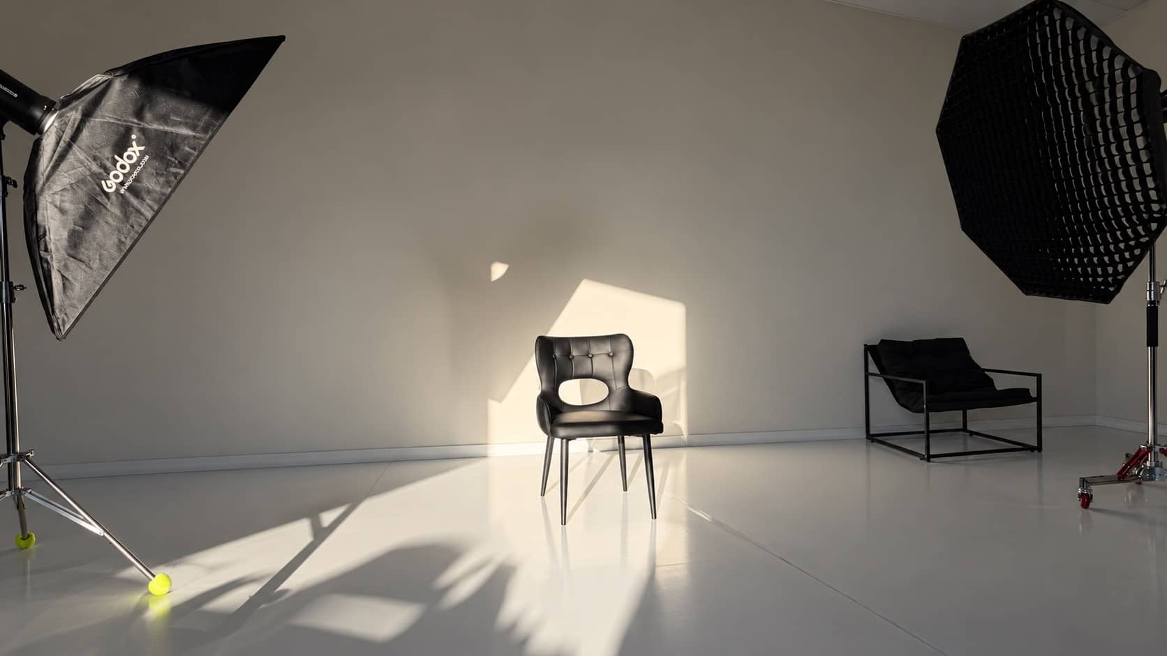 Lumen Studio photography space with professional softboxes and seating